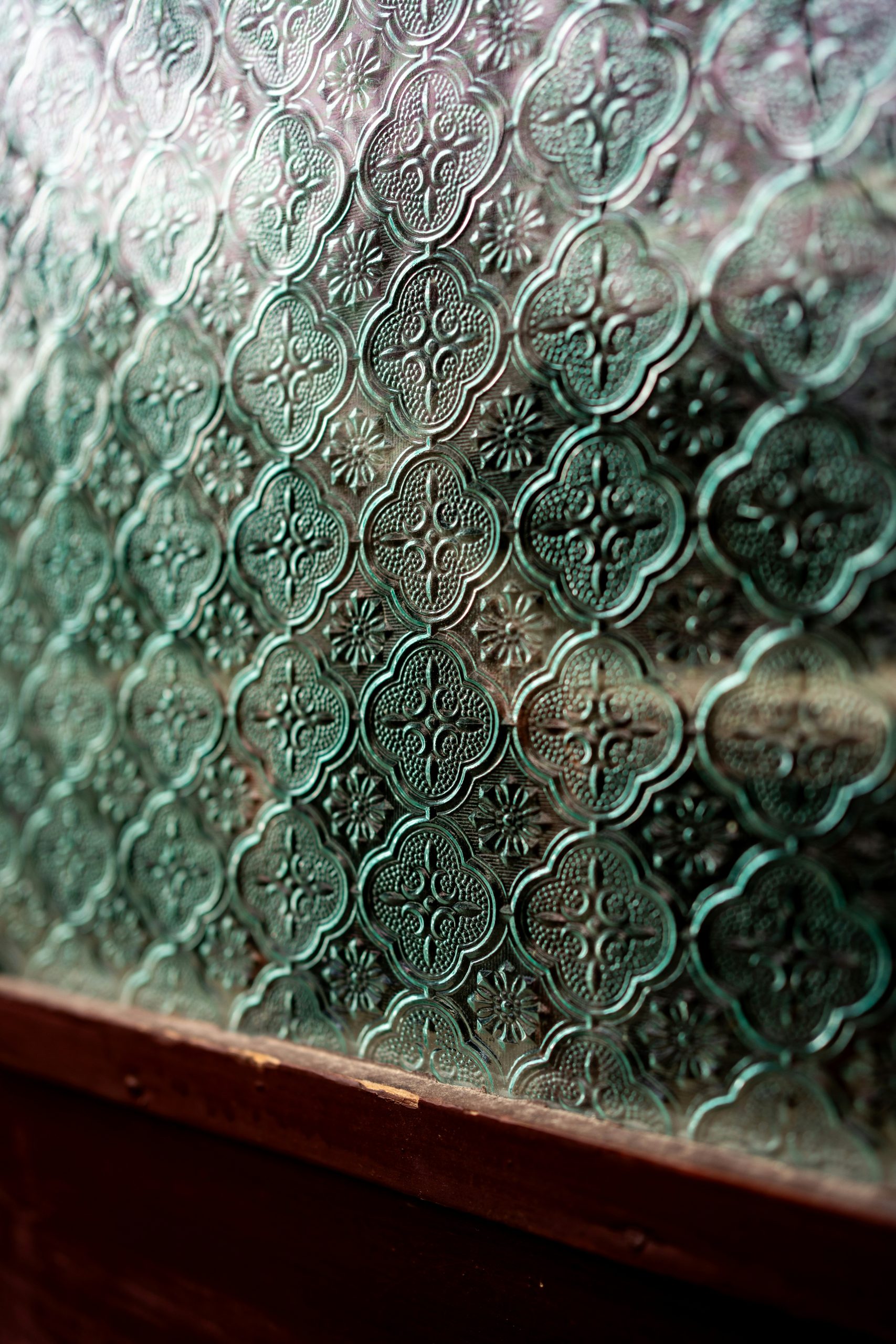 Decorative window film delivers the etched/frosted glass look for a fraction of the cost, with no demolition, no lead time, & full design flexibility.
